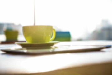 Focus shot of coffee cup on table