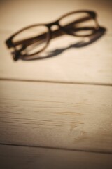 Black eyeglasses kept on table