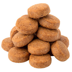 A pile of small round brown dog buns. The cookies are stacked on top of each other and are all the same size. Dog treats on a transparent background in png format
