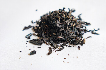 Dry tea leaves isolated on white background. Lapsang isolated. keemun top view