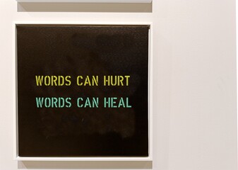 Photo frame with text  written Words can hurt , Words can heal -  words are powerful enough to lead...