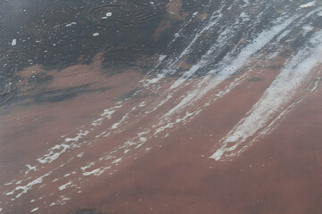 Abstract red grunge texture with white streaks background