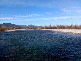 Golden Sunrise Over Misty Mountain Peaks