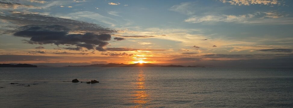 June 22 2025, Matsuyama, Ehime, Japan - An image of a golden sunset of the Seto Naikai Marine National Park