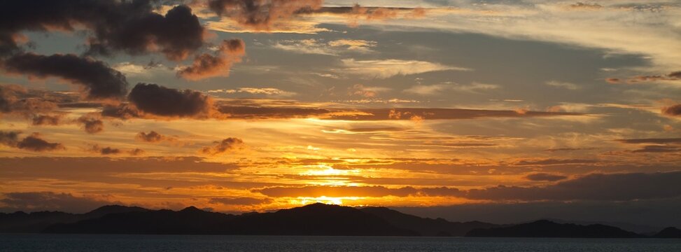 June 22 2025, Matsuyama, Ehime, Japan - An image of a golden sunset of the Seto Naikai Marine National Park