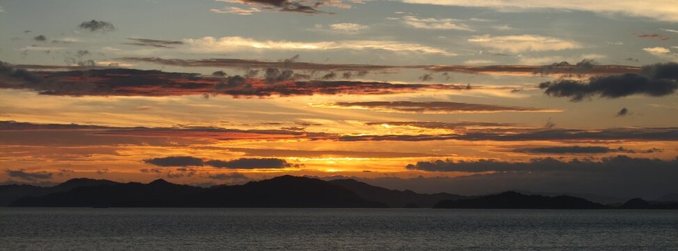 June 22 2025, Matsuyama, Ehime, Japan - An image of a golden sunset of the Seto Naikai Marine National Park