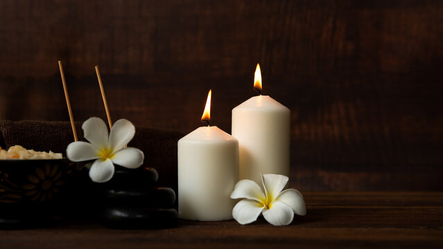 Thai spa massage.  Spa treatment cosmetic beauty. Therapy aromatherapy for care body women with candles for relax wellness. Aroma and salt scrub setting ready healthy lifestyle