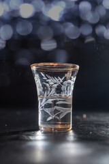 Small glass filled with anise-flavored drink, capturing the essence of traditional taste, herbal aroma, and cultural rituals in a minimal and elegant presentation.