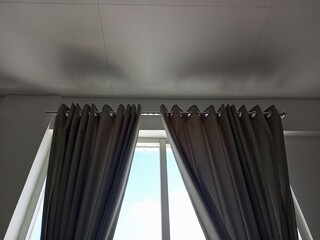 Modern Grey Curtains on Rod with Window View