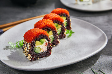 California maki with black rice and tobiko, bright mood, side-angle plate composition