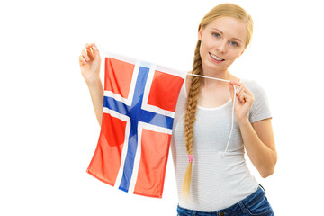 Young woman with norwegian flag