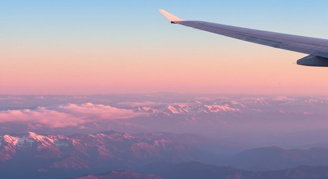 Aerial view of mountains from airplane window - Powered by Adobe