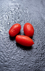 Fresh cherry tomatoes arranged in a natural setting, showcasing vibrant color, juicy texture, and organic appeal ideal for healthy cooking and garden-fresh inspiration.