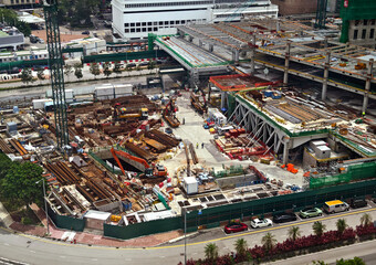 An aerial perspective showcasing a construction site located in a bustling city
