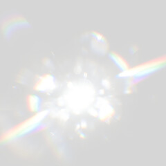 Radiating central lens flare with soft scattered rainbow-colored light effects on transparent background