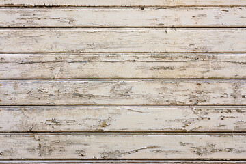 Background of old wooden boards with peeling paint
