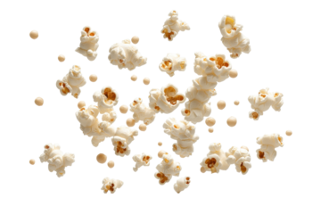 Scattered Popcorn Kernels in Mid-Air Against a Transparent Background Ready for Snacking