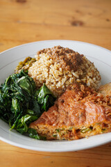 Nasi Padang with Minang-Style Omelette, Indonesia, captured on June 22, 2025. Traditional rice dish...