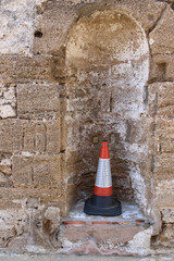 Traffic cone in Castle of San Sebastián in Cadiz, Andalusia. Spain	