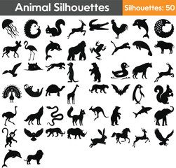 Fototapeta premium Set of 50 black and white animal vector silhouettes, featuring iconic wild and domestic animals in bold minimalistic styles, ideal for branding, digital art, and merchandise.