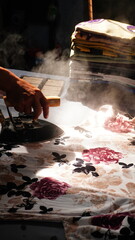 Ironing with a Steam Iron