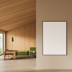 Modern framed empty poster template on beige wall in stylish wooden interior with green furniture...