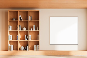 Minimalist interior with wooden bookshelf and large blank poster frame on wall for design mockup or branding presentation concept template. 3D Rendering