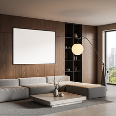 Modern minimalist living room with blank frame, wooden wall panels, grey modular sofa, and...