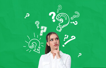 Thoughtful woman surrounded by question marks on green backgroun