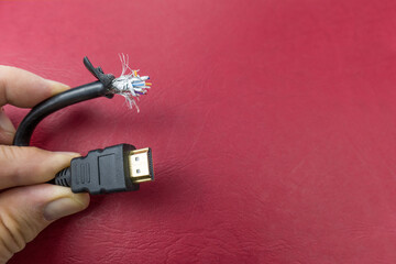 Cut hdmi cabel on ared background