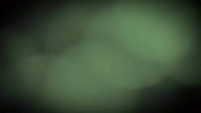 Soft, unfocused, blurry green and dark gradient background