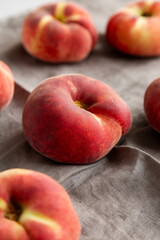 Fresh juicy ripe fig peaches, side view.