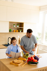 Cooking together in a cozy kitchen while sharing smiles and delicious recipes on a sunny afternoon