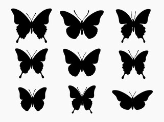 Collection of Nine Butterfly Silhouettes in a Grid Pattern on White Background