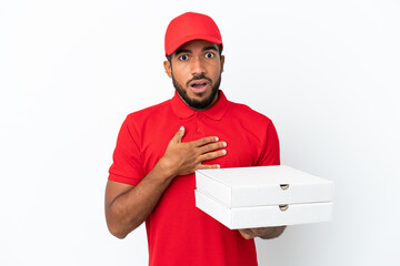 pizza delivery man picking up pizza boxes isolated on white background surprised and shocked while...