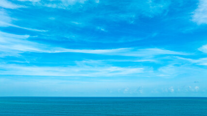 Panorama of cloud clear sky background for summer vacation concept at ocean and summer sea water with sunlight of beautiful cloudy	
