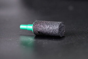 Aquarium air sprayer on a black background