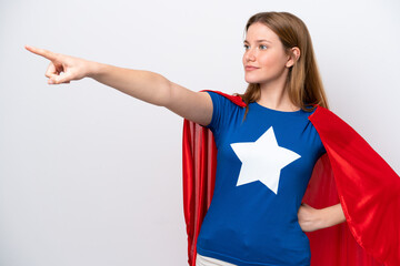 Young caucasian woman isolated on white background in superhero costume with proud gesture © luismolinero