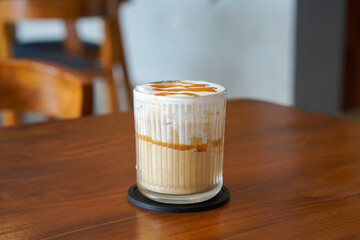 Iced Butterscotch Latte, Indonesia, captured on June 22, 2025. A chilled espresso drink blended...