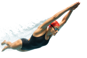 Underwater female swimmer in red swim cap diving in streamlined pose