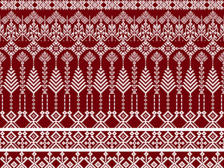 Traditional red and white textile pattern featuring intricate geometric and floral motifs in a repetitive symmetrical design.