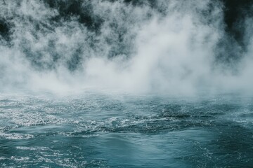 Obraz premium Fog envelops tranquil waters creating a serene and mysterious atmosphere at dawn, white fog covering over water