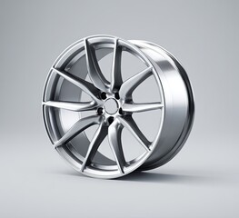 Fototapeta premium Sleek, silver alloy wheel with a multi-spoke design, showcasing a polished, metallic finish against a neutral backdrop