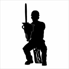 silhouette of a man with a chainsaw