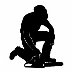 silhouette of a man with a chainsaw