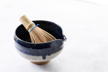 Japanese tea bowl glazed with blue and white color and Chasen or Bamboo whisk, an equipment for...