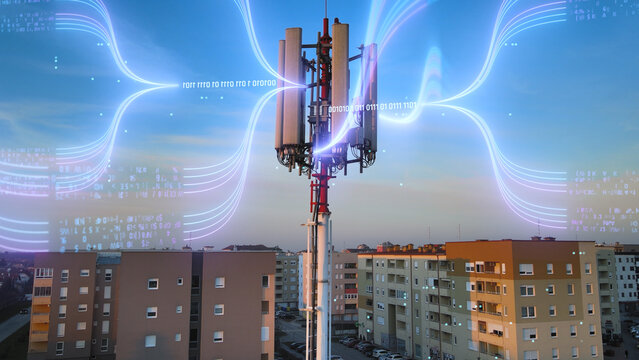 Futuristic 5G telecom tower connects smart city with animated network lines and business infrastructure concept