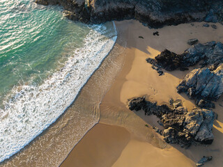 Beautiful aerial drone landscape image of Holywell Bay in Cornwall during colorful vibrant Summer...