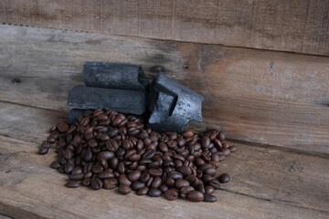 Coffee beans on a wooden background