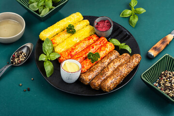 Assortment of fresh grilled sausages.